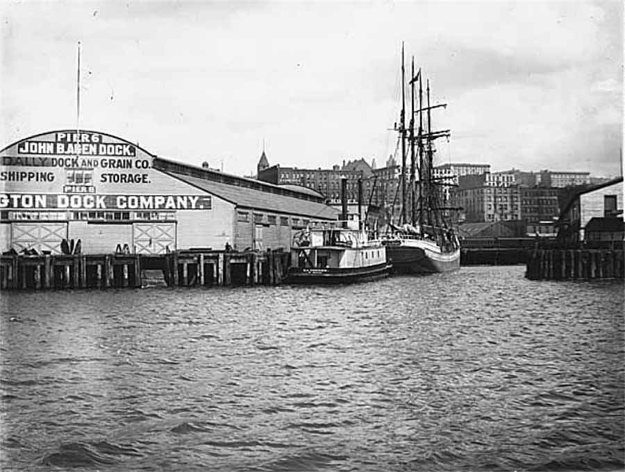 A tall ship docked at pier 6 on Seattle's Waterfront, circa 1950
