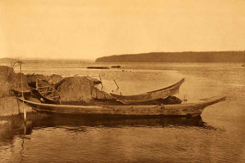 Historic Coast Salish cedar canoe on Puget Sound waters