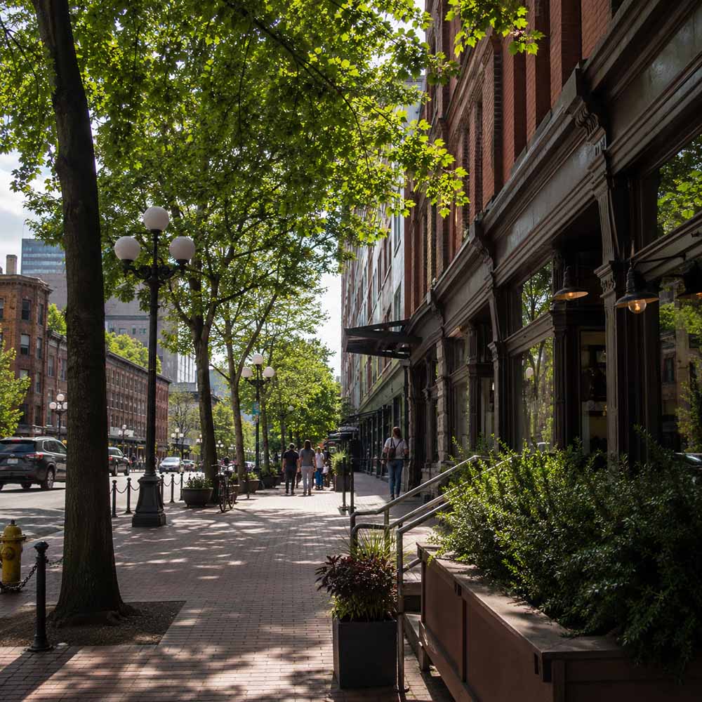 Pioneer Square history. A modern photograph of Yesler Way running through today's Pioneer Square.